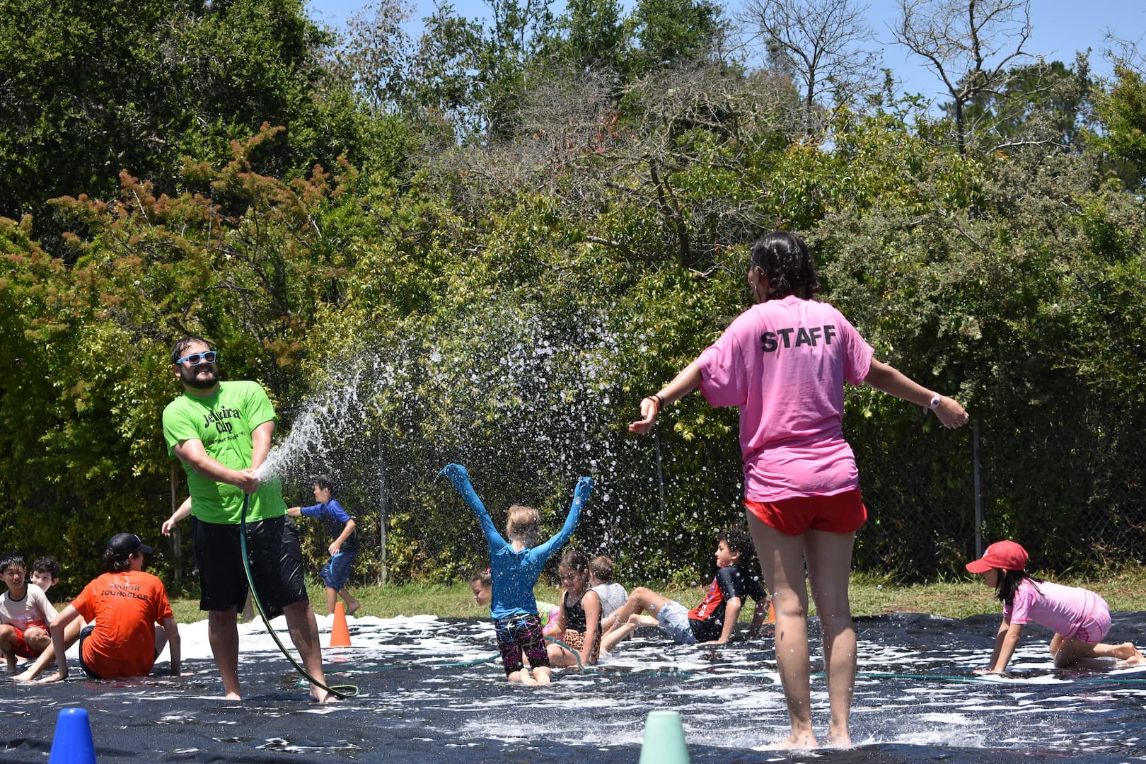 spraying hose on tarp